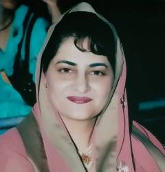 Dr. Mujahida